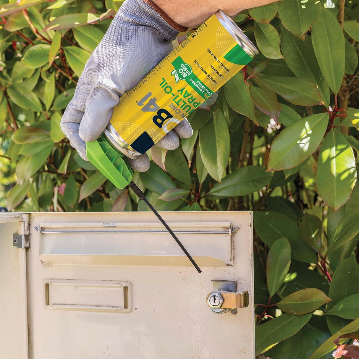 Person using a can of OB41 on a bolt