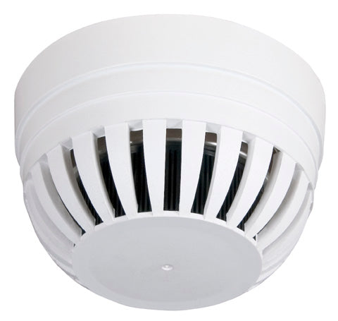 A white, ceiling-mounted smoke sensor