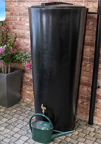 Black water butt with a brass tap