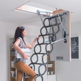 Metal Scissor Loft Ladder with person climbing