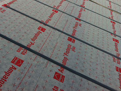 Roofing membrane with integrated tapes